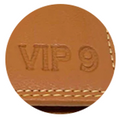 A close-up of a brown wallet embossed VIP 9 text over.