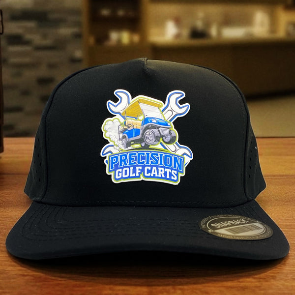 Black snapback hat with colorful Precision Golf Carts logo featuring wrenches and a blue golf cart.
